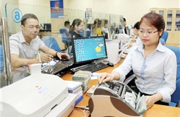 Điều chỉnh tỷ giá là 'chung lưng' cùng doanh nghiệp xuất khẩu 